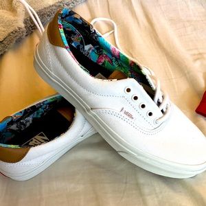 Super cute white vans with floral inside. BRAND NEW.